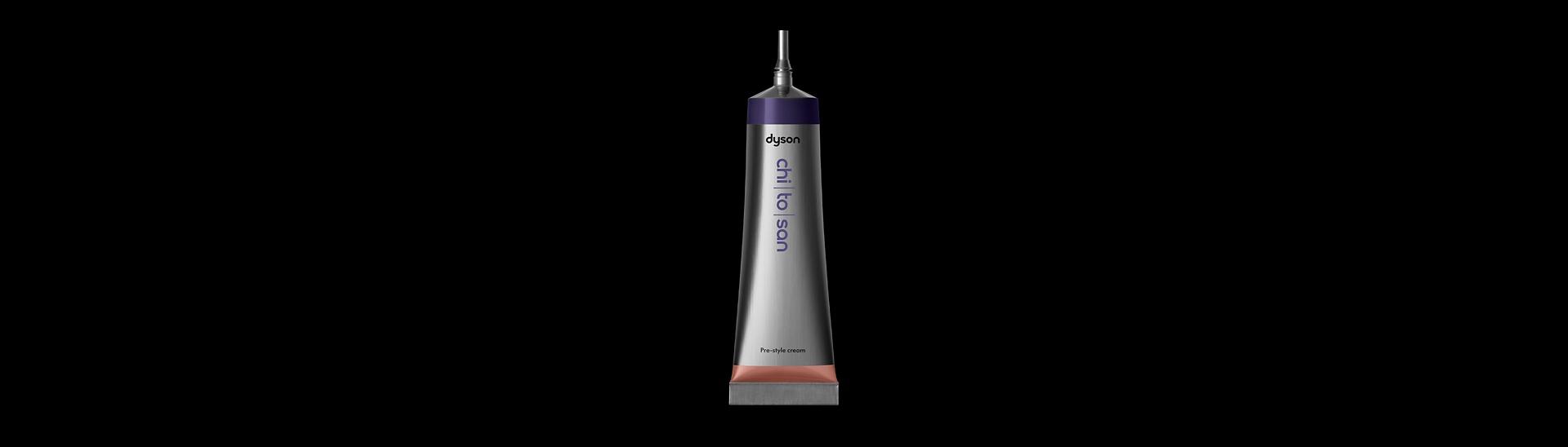 Dyson Chitosan Pre-style cream mini 15ml packshot on a dark background.