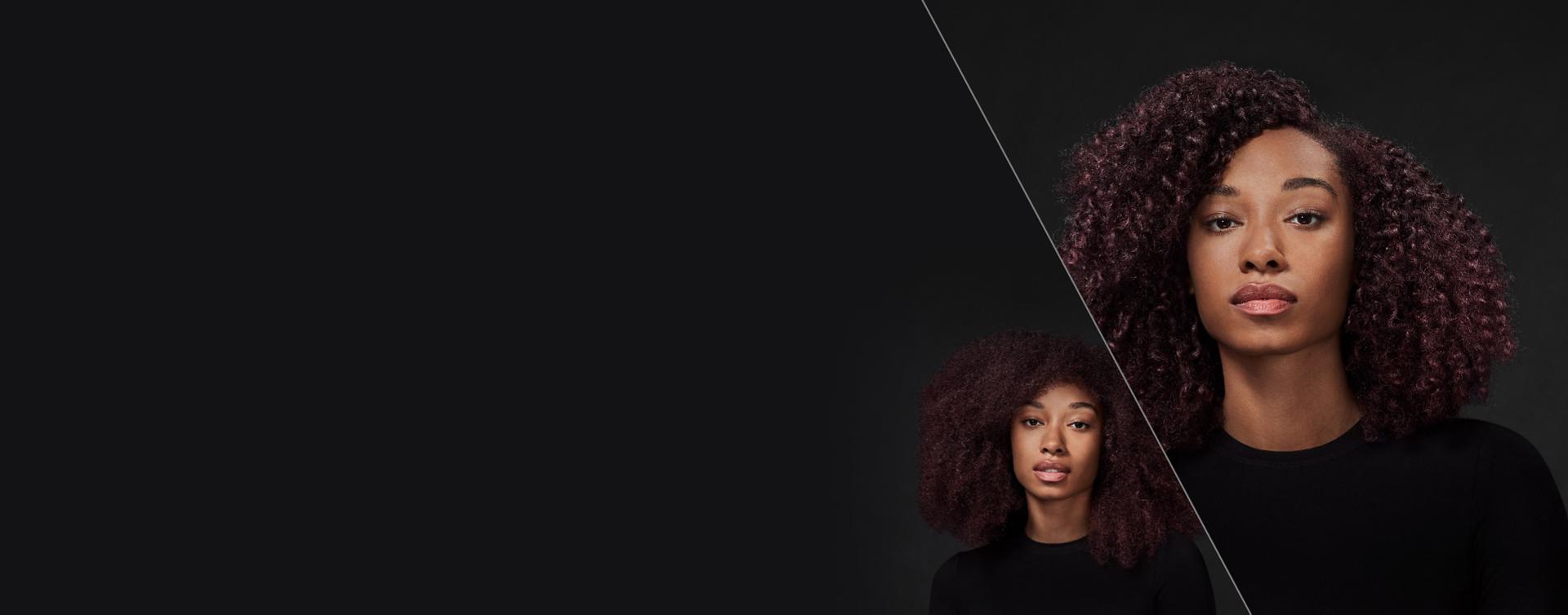 A model with red-brown hair. On the left, her long, coily hair is unstyled. To the right, it is styled with defined, diffused coils.