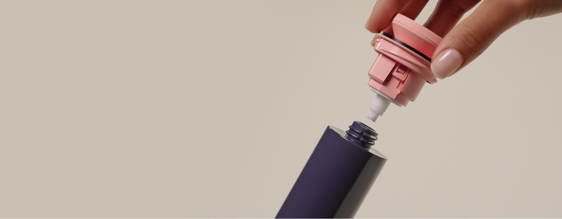 Inner cartridge being removed from pump-bottle