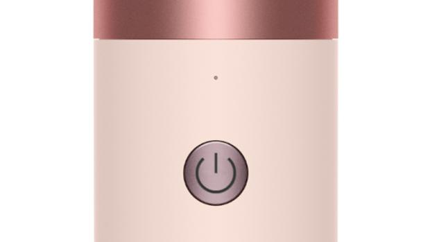 The Power button on the Dyson Airwrap Co-anda2x multi-styler and dryer.