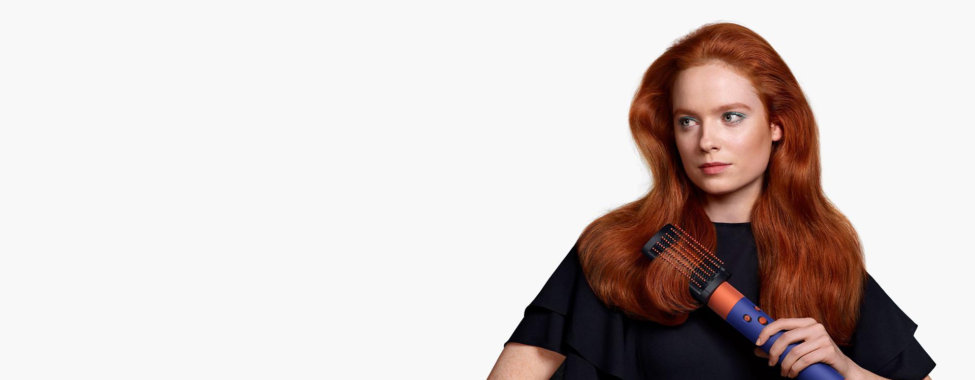 Model using the Airwrap i.d. multi-styler and dryer.