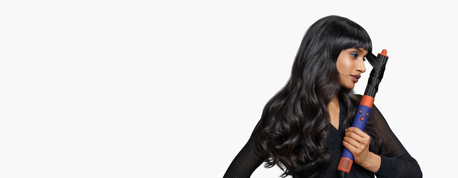 Model using the Airwrap i.d. multi-styler and dryer.