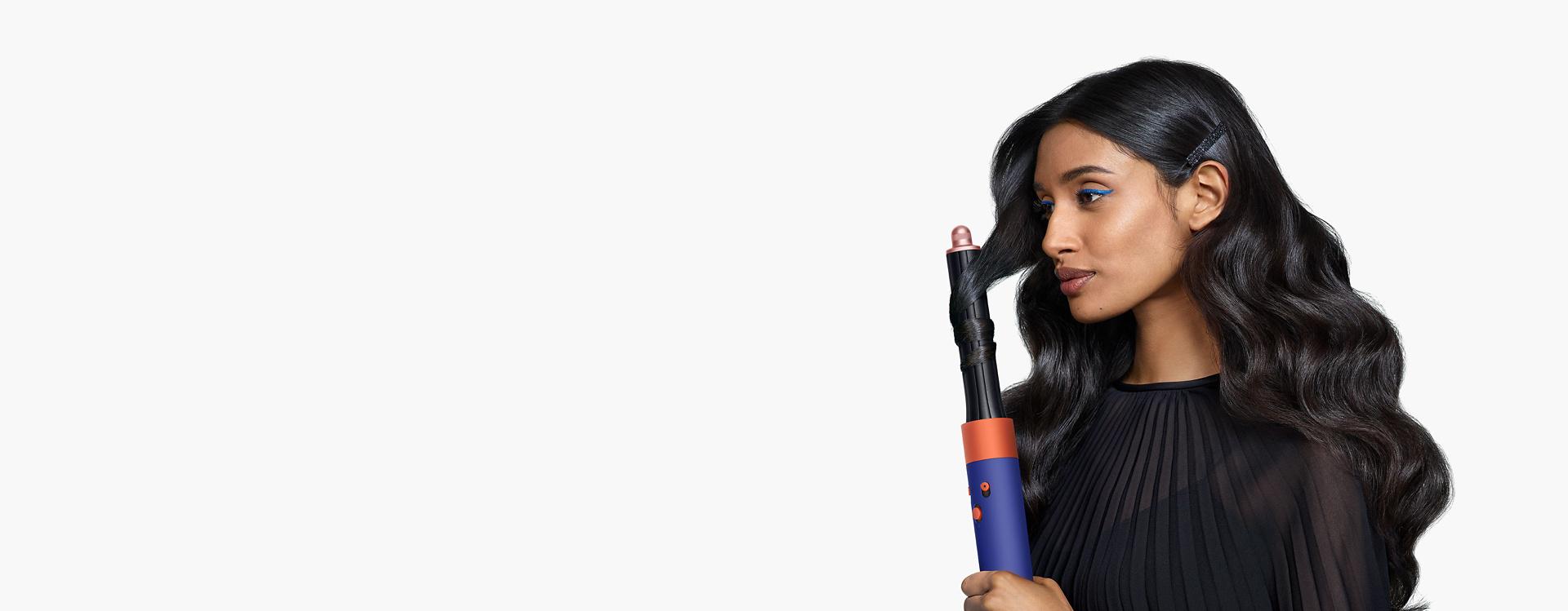 Model using the Airwrap i.d. multi-styler and dryer.