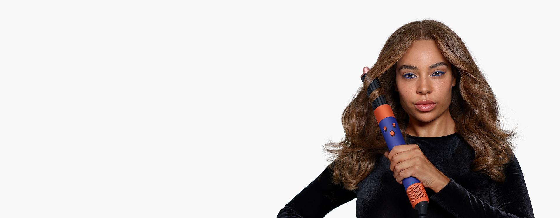 Model using the Airwrap i.d. multi-styler and dryer.