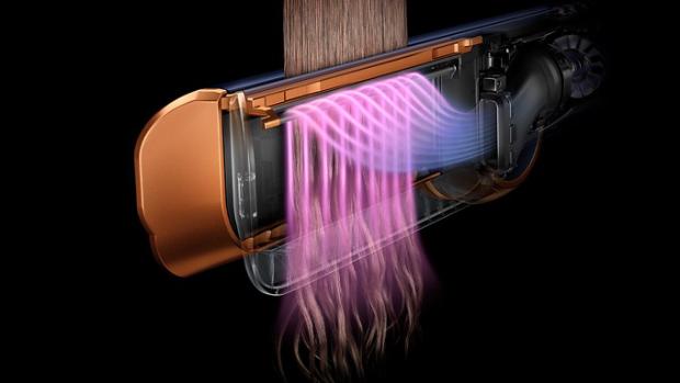 A detailed cutaway view of the inside of the Dyson Airstrait straightener, showing the heating system.
