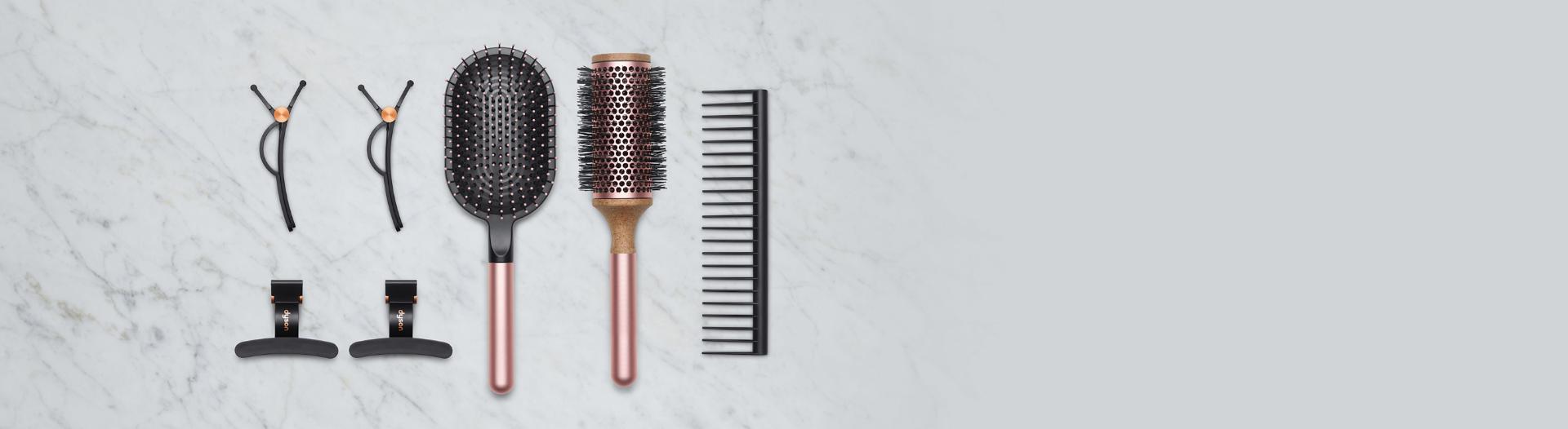 A selection of Dyson hair care attachments and accessories.