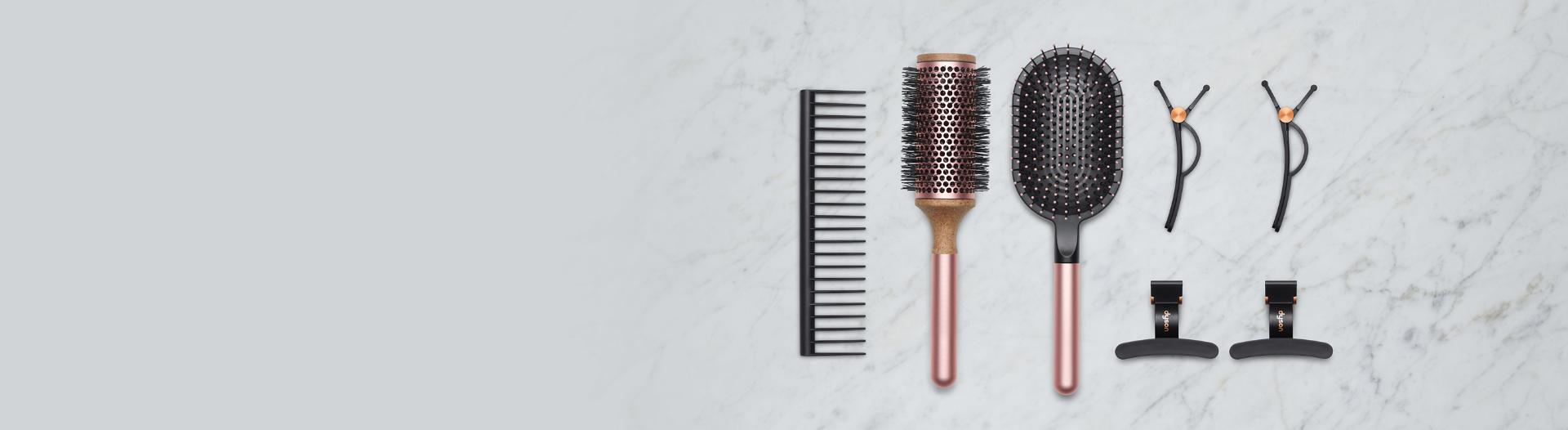 A selection of Dyson hair care attachments and accessories.