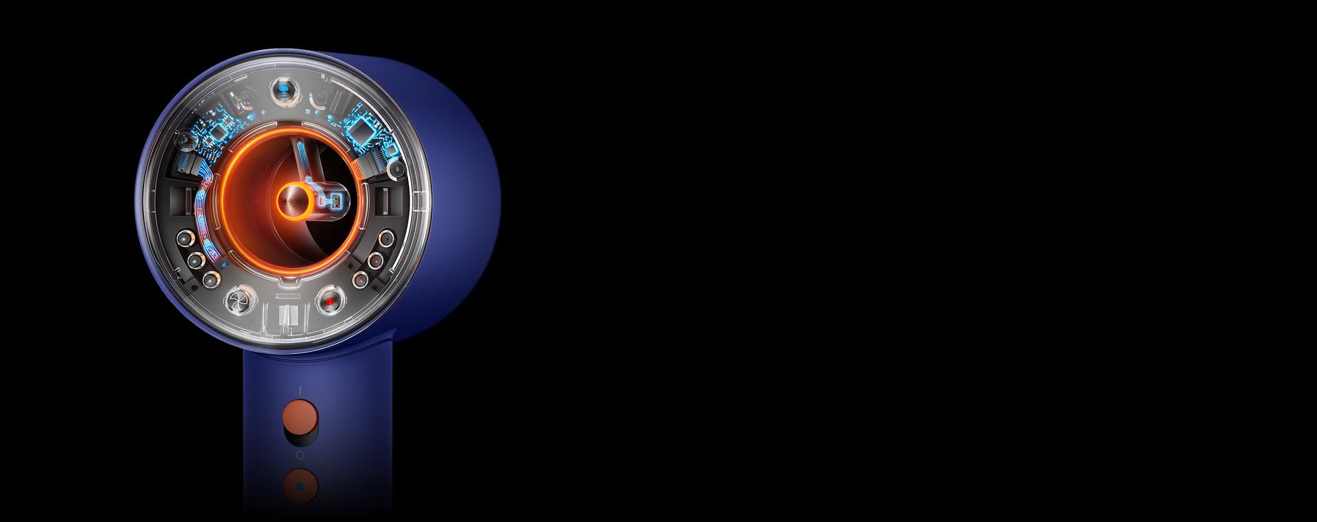 Saç kurutma makinesinin turuncu renkte parlayan Kapsül aydınlatmasının yakından görünümü