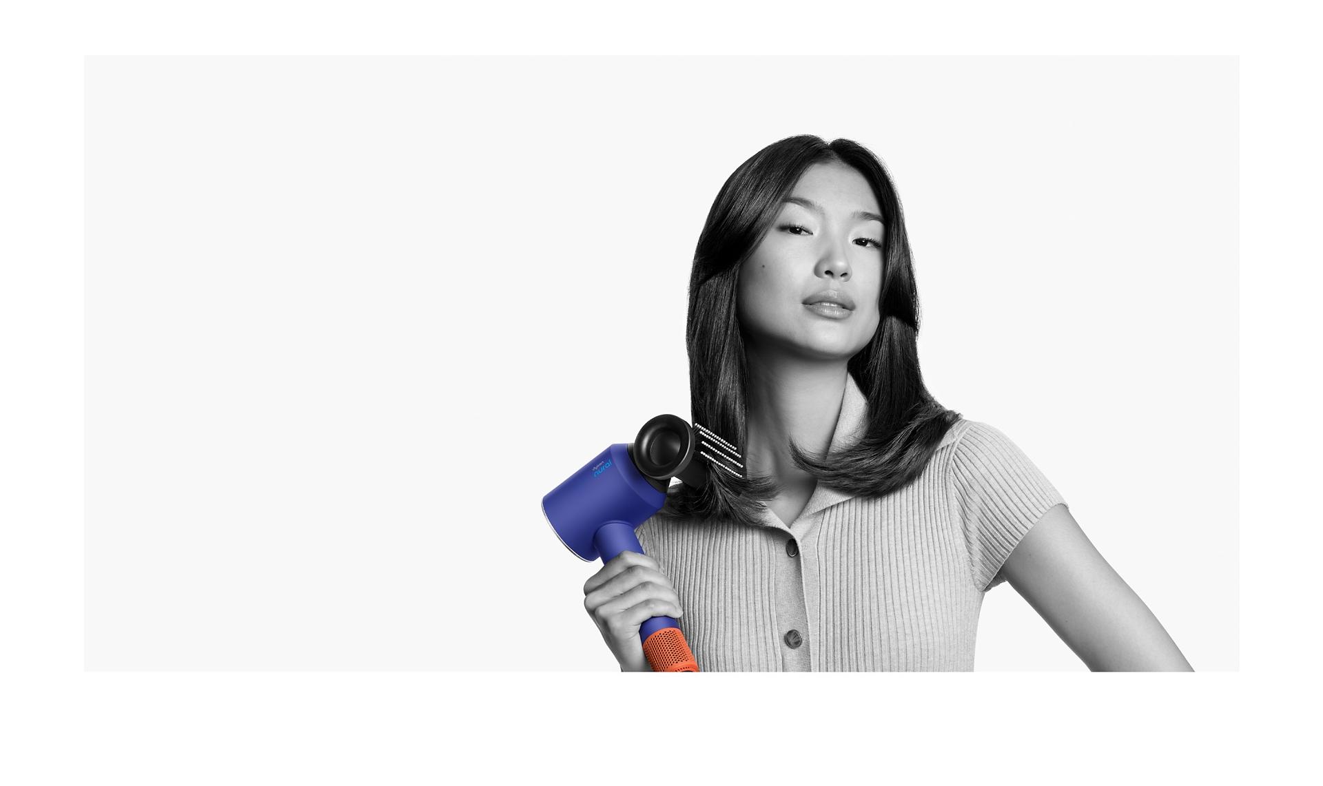 Female model using the Flyaway smoother