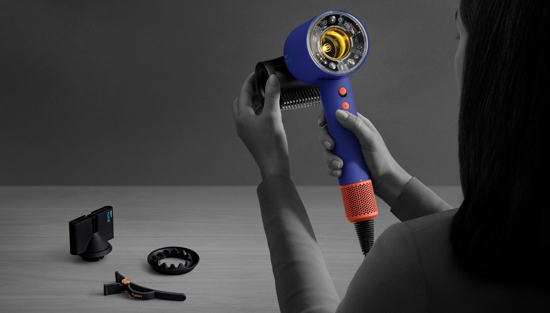 Connecting an attachment to the hair dryer