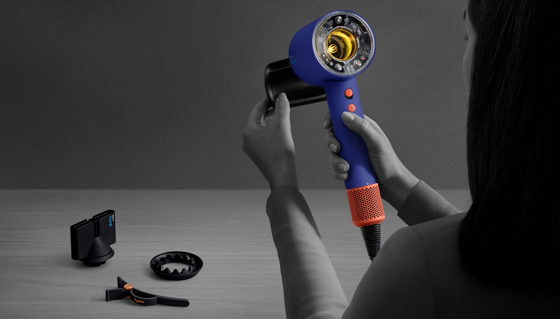 Connecting an attachment to the hair dryer