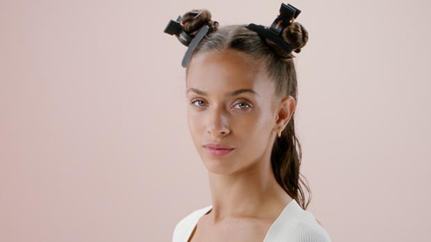 Female model using Dyson hair clips