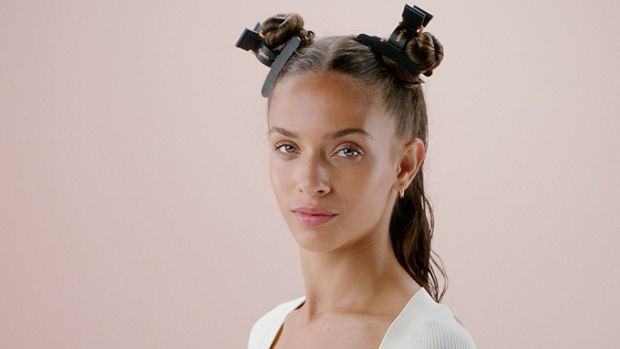Female model using Dyson hair clips