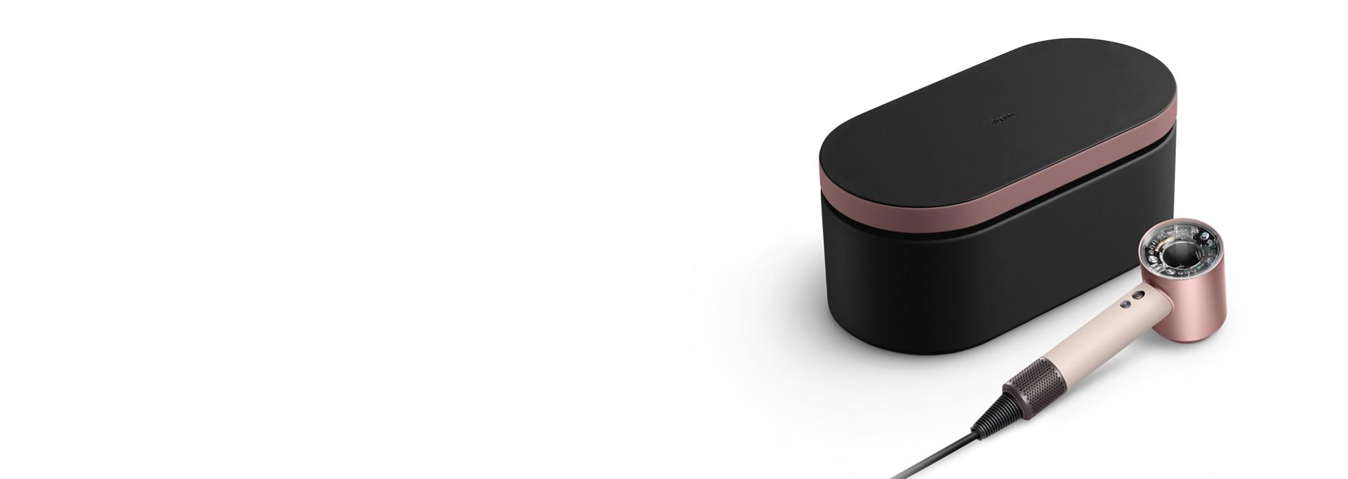 The Dyson Supersonic Nural hair dryer and Presentation case in the Ceramic pink colourway.