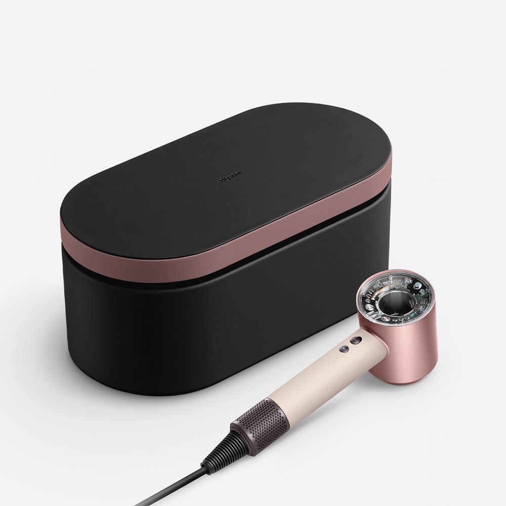 The Dyson Supersonic Nural hair dryer with a range of attachments.