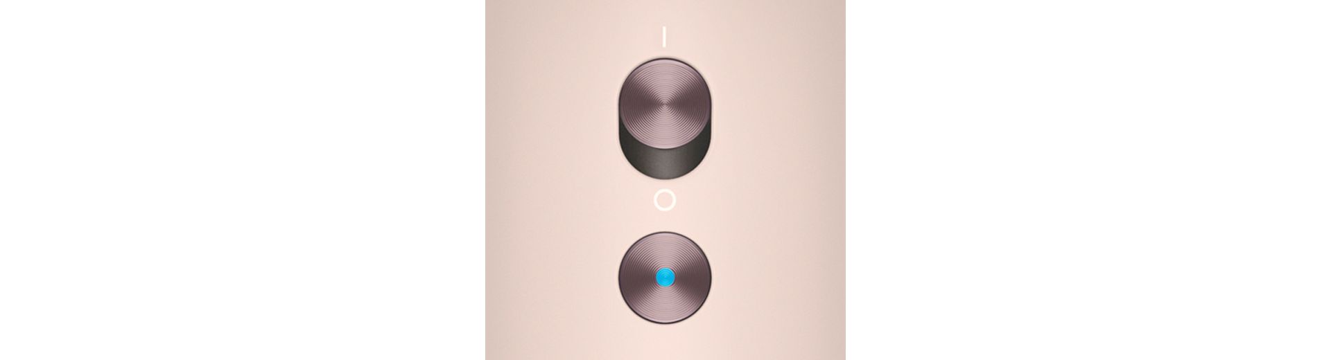 A close up of the buttons on the handle of the Dyson Supersonic Nural hair dryer.