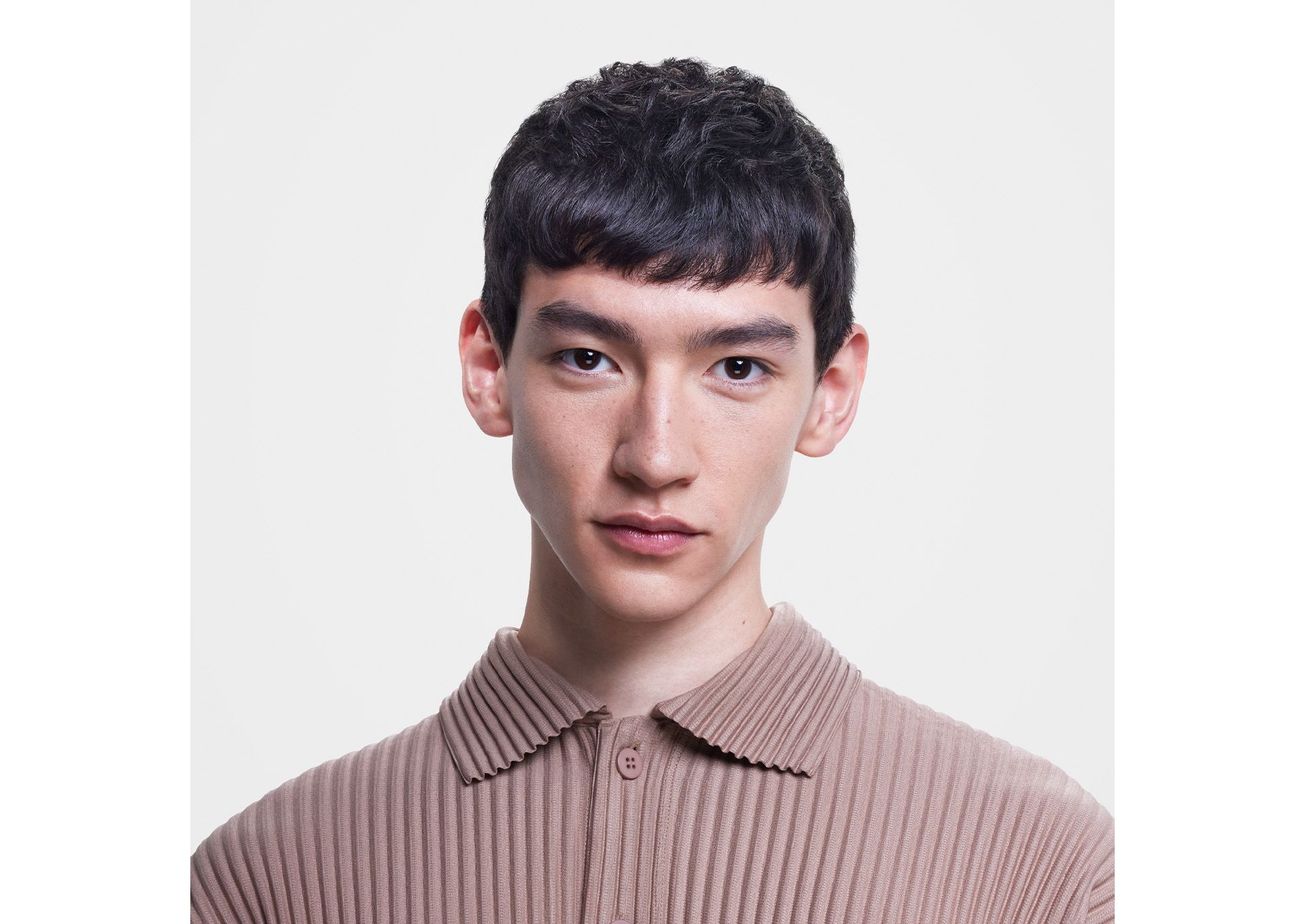 Male model with short, straight hair