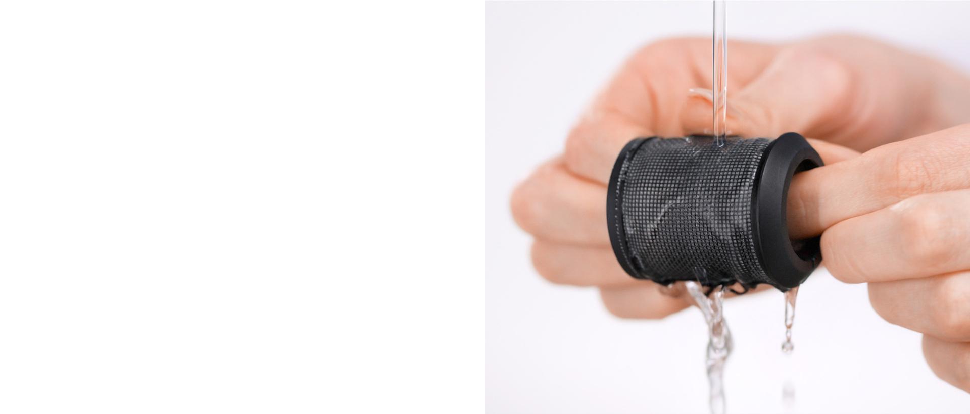 Owner rinsing the internal filter.