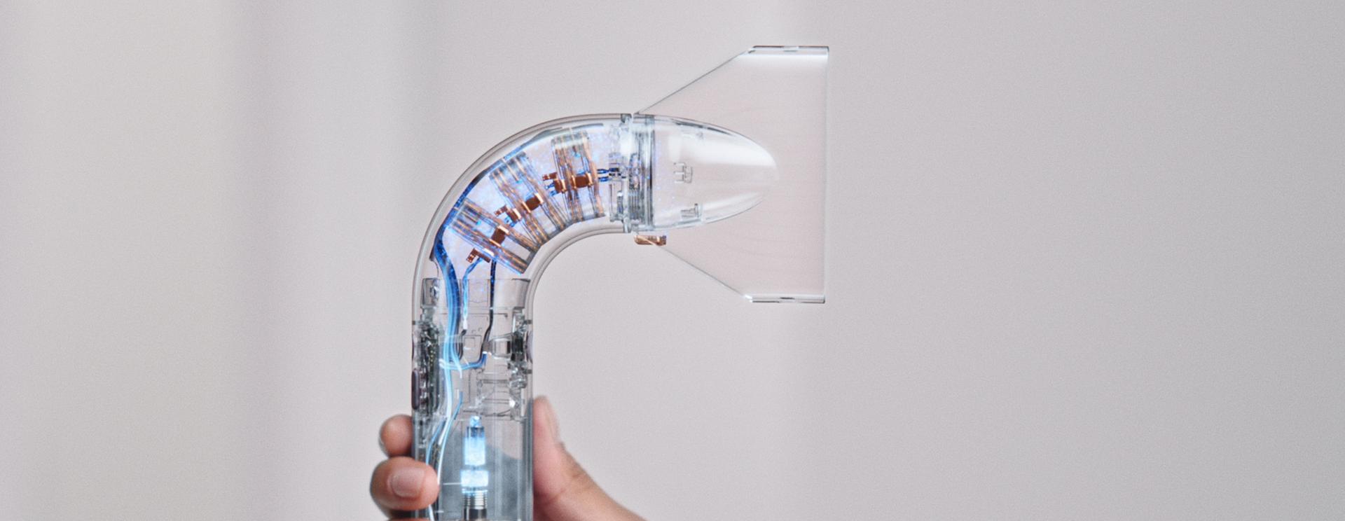 The Pro concentrator attachment is attached to the Dyson Supersonic r hair dryer.