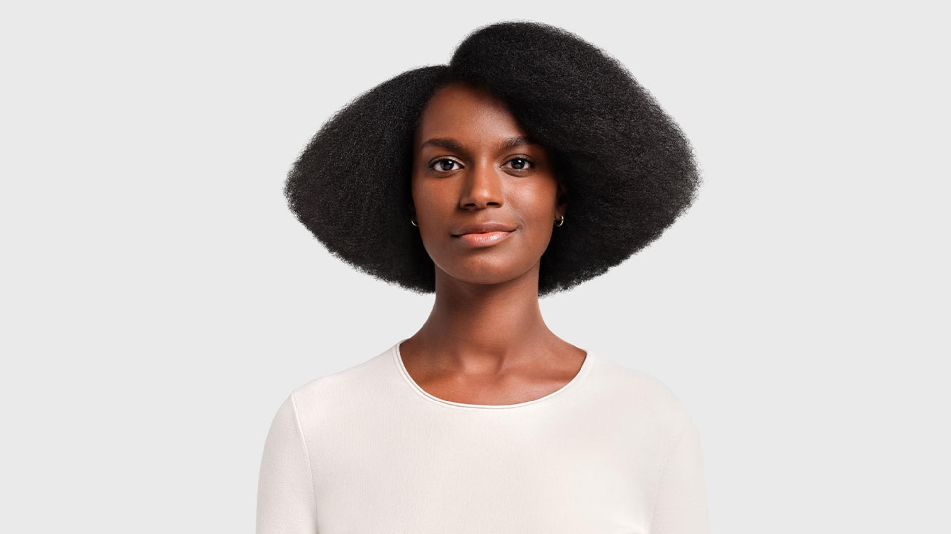 Model with Stretched blowout styled hair.