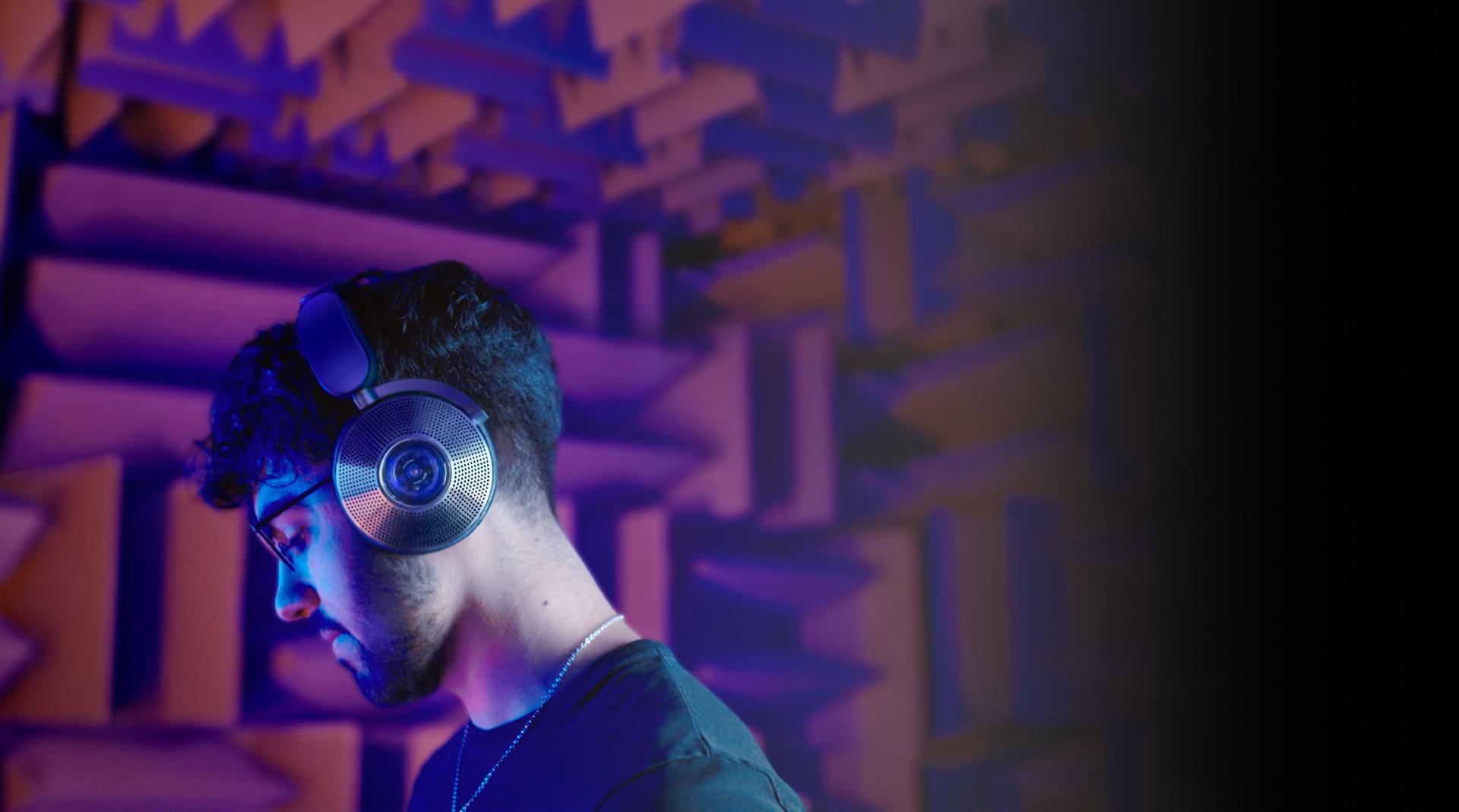 Engineer in acoustic chamber.