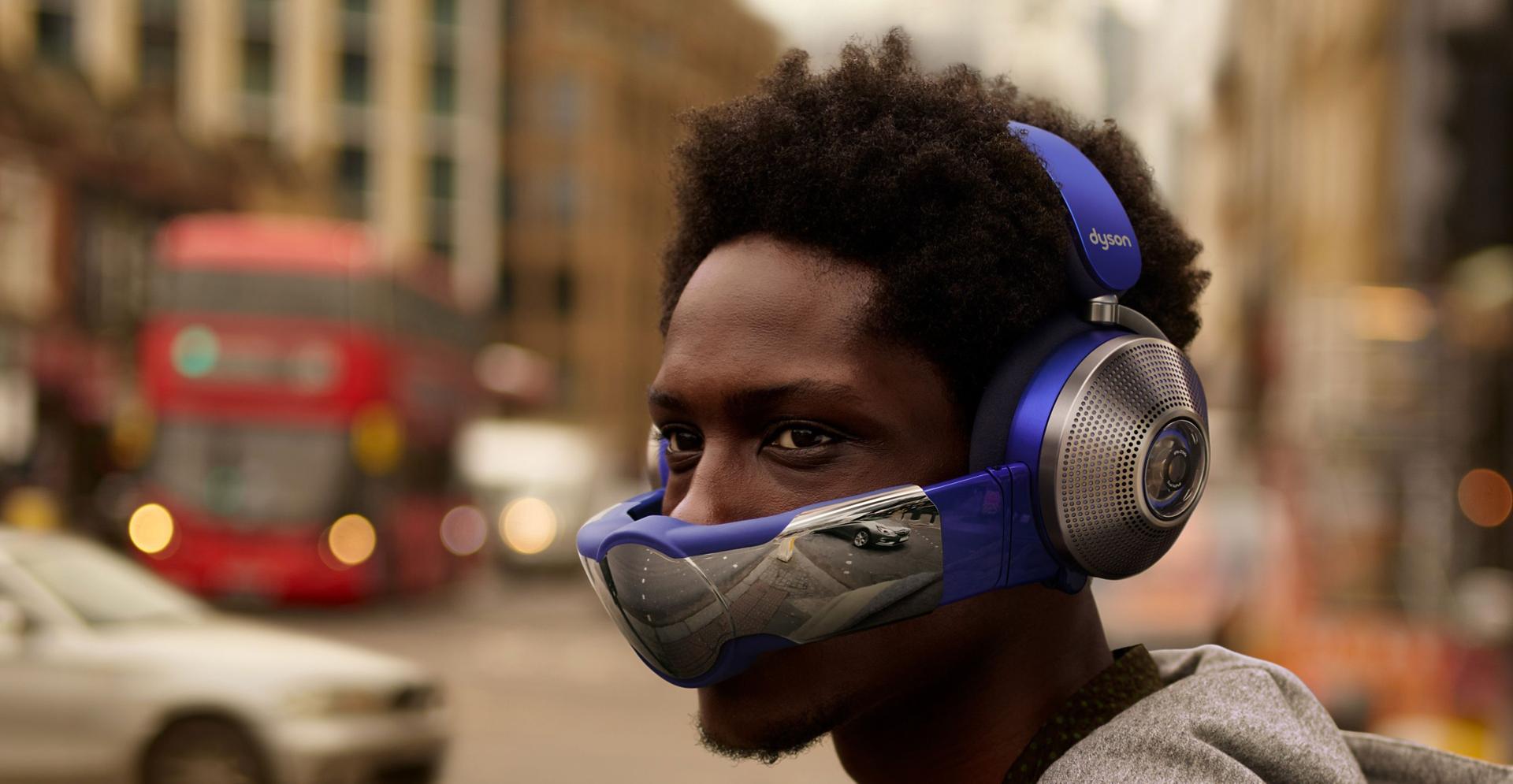 Man wearing Dyson Zone noise cancelling headphones. Visor is attached. 