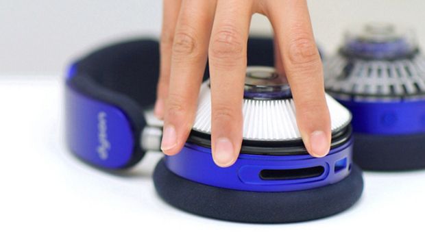 Filter being placed in ear cup.