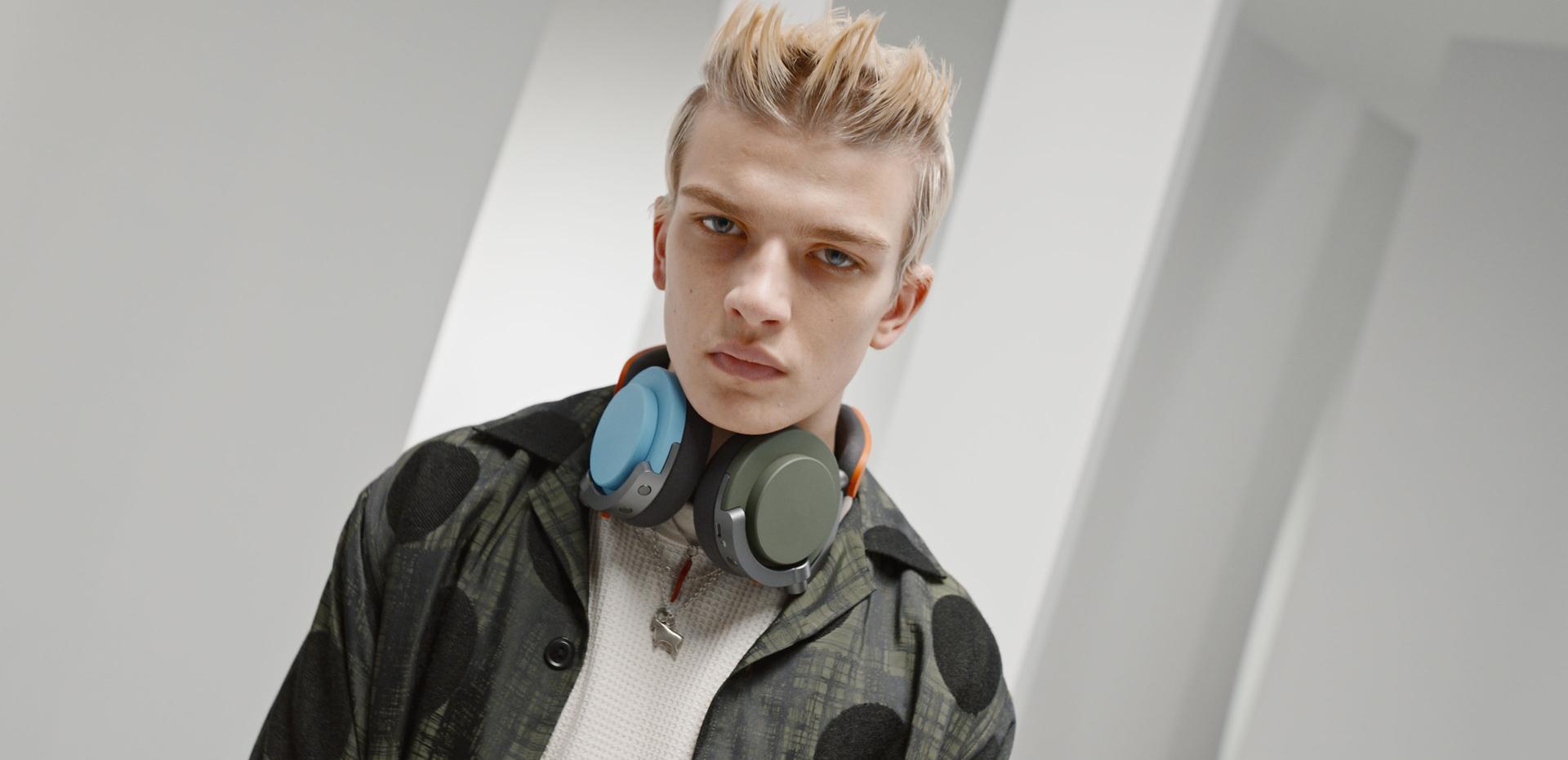 GIF of a model wearing Dyson OnTrac headphones while the different accessories change, highlighting the variety.