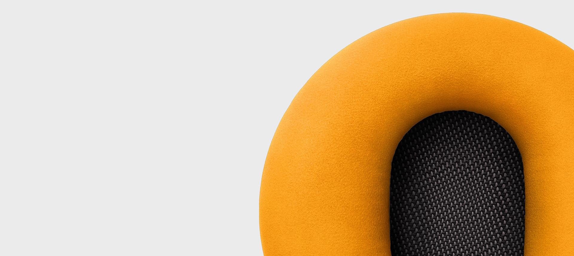 A model wearing the Dyson OnTrac headphones.