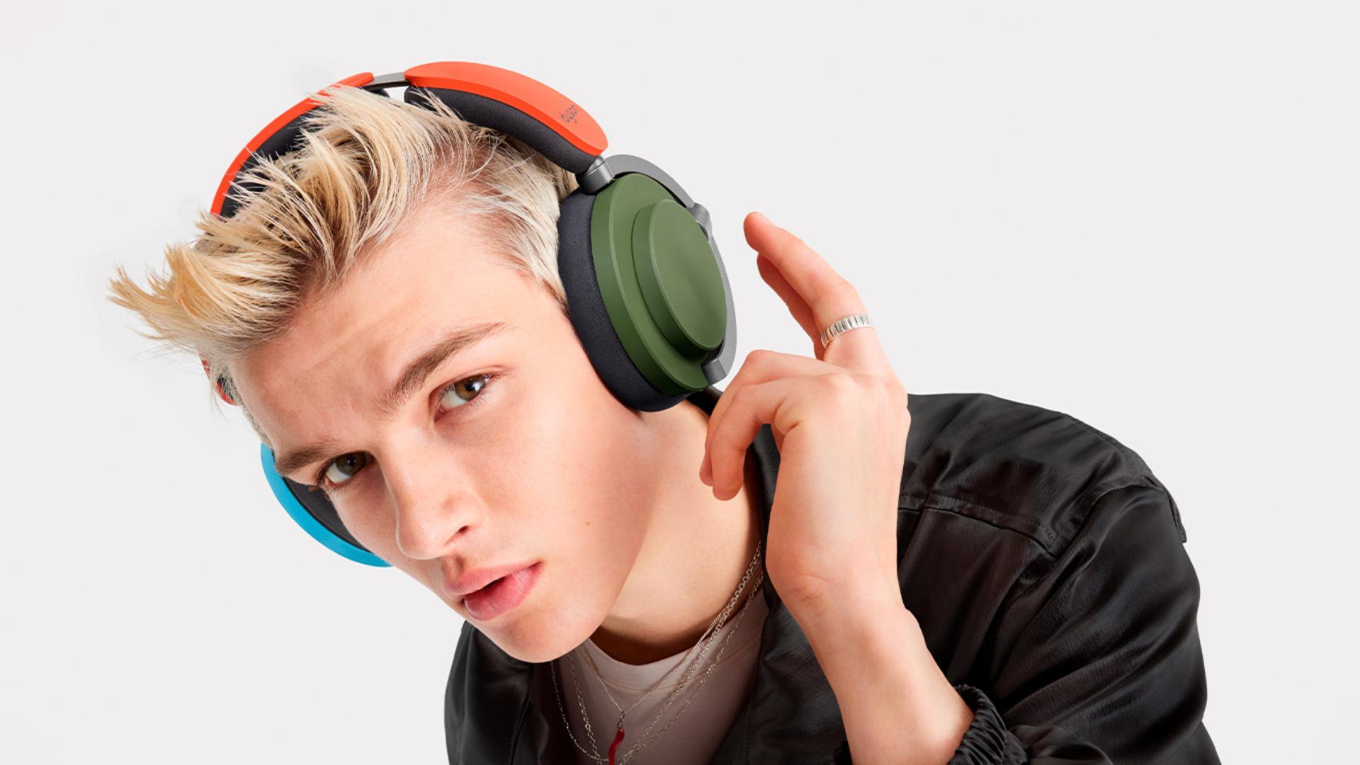 A model wearing the Dyson OnTrac headphones.