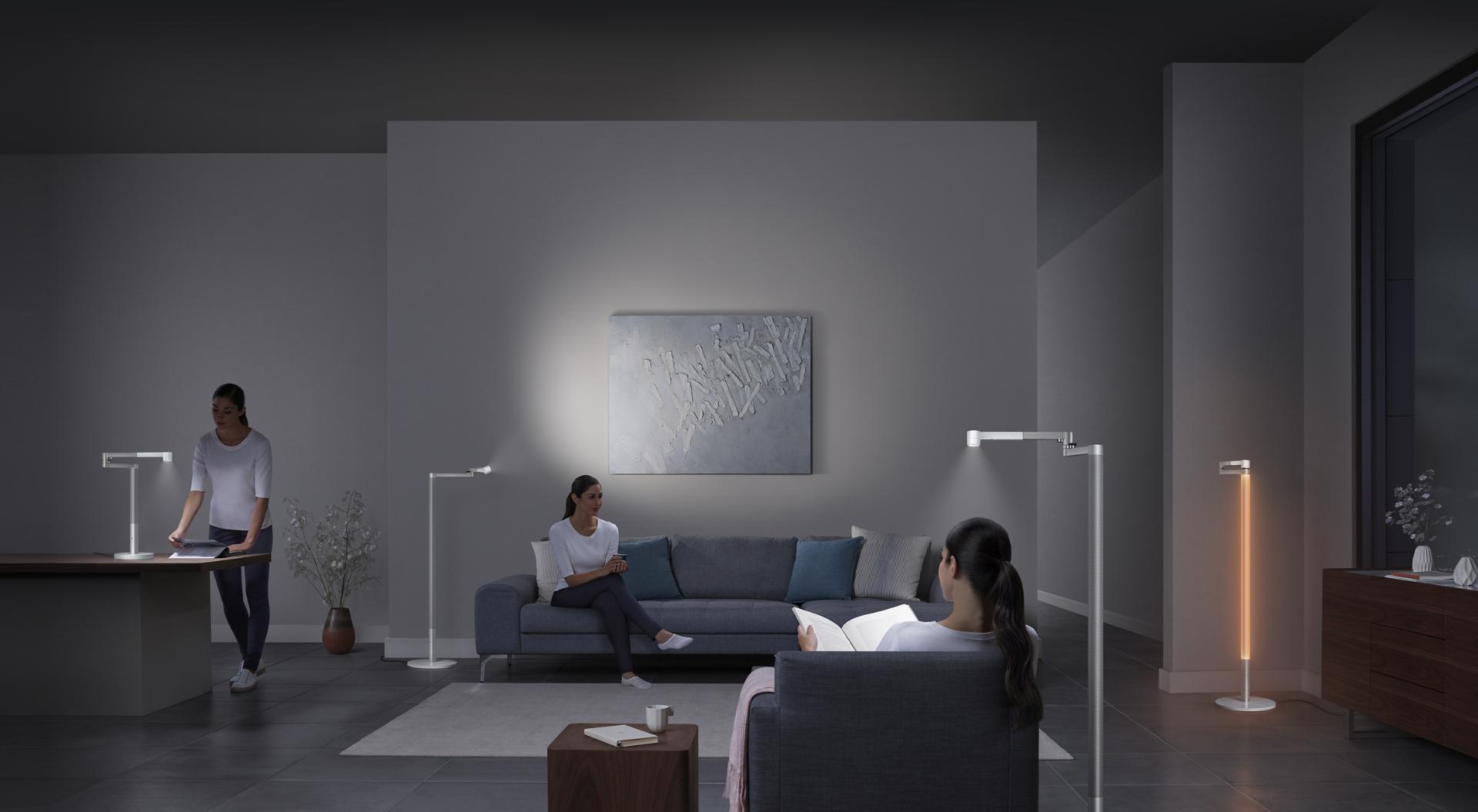 Multiple Dyson Lightcycle Morph lights being used in different ways in a room