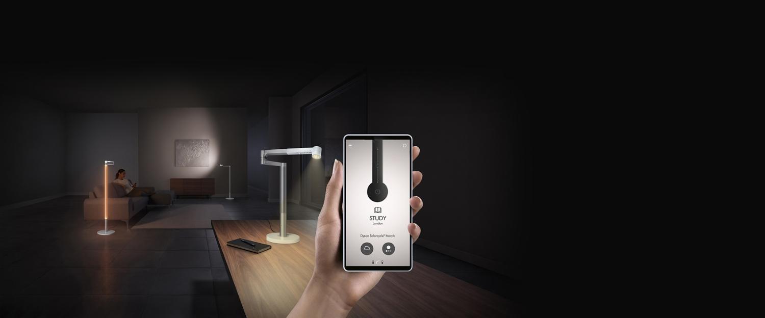 Hand holding a mobile featuring the MyDyson app