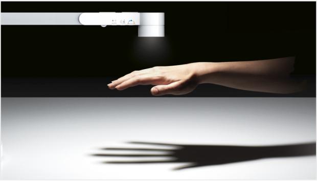 Real life hand demonstrating motion sensor functionality