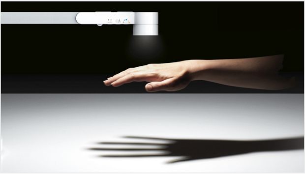 Real life hand demonstrating motion sensor functionality