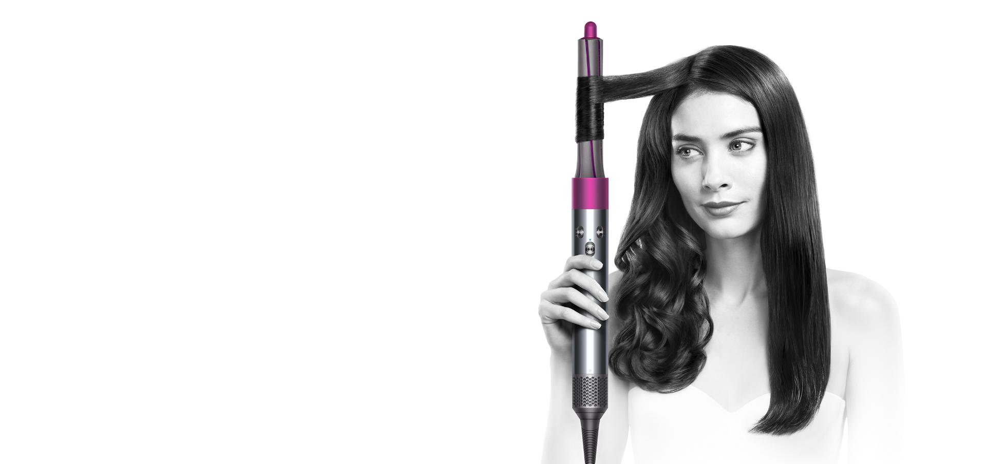 Model using Dyson Airwrap™ styler
