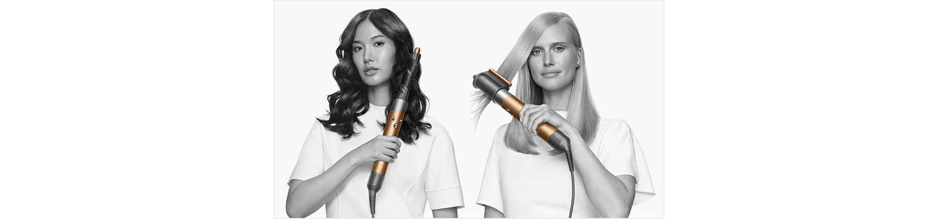 Two models using the Dyson Airwrap multi-styler, with a barrel attachment and the Coanda smoothing dryer attachment.
