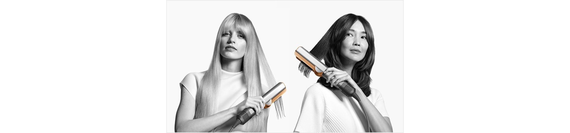 Two models using the Dyson Airstrait straightener.