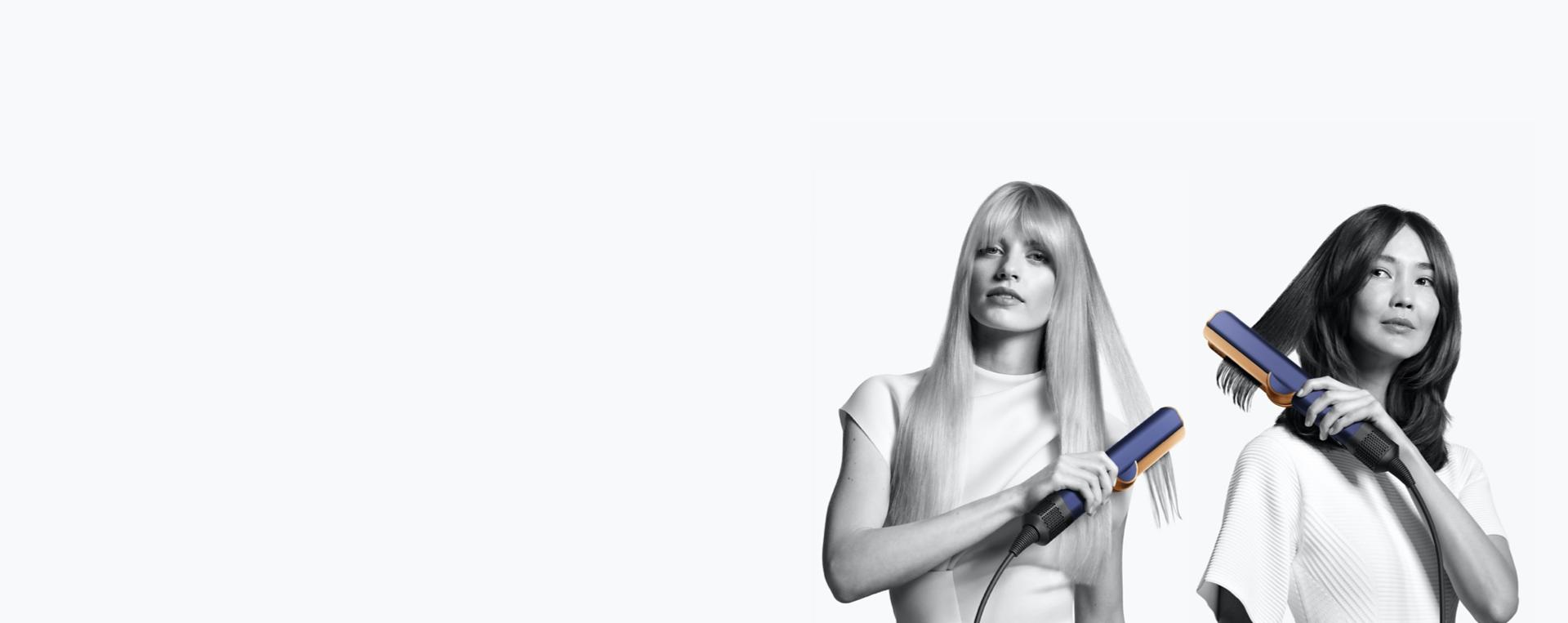 Two models using the Dyson Airstrait straightener.