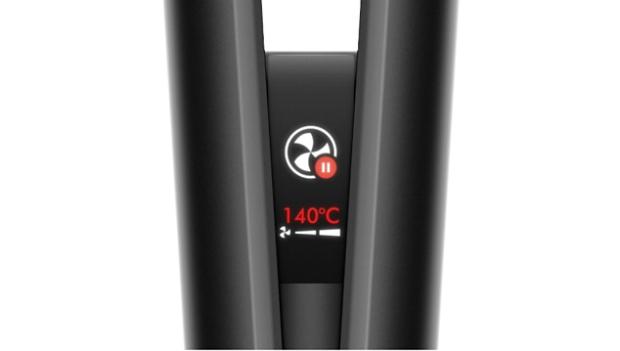 Close-up of the Dyson Airstrait LCD screen, showing the auto-pause animation.