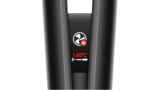 Close-up of the Dyson Airstrait LCD screen, showing the auto-pause animation.