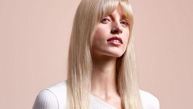 Model with long, blonde, dry hair.