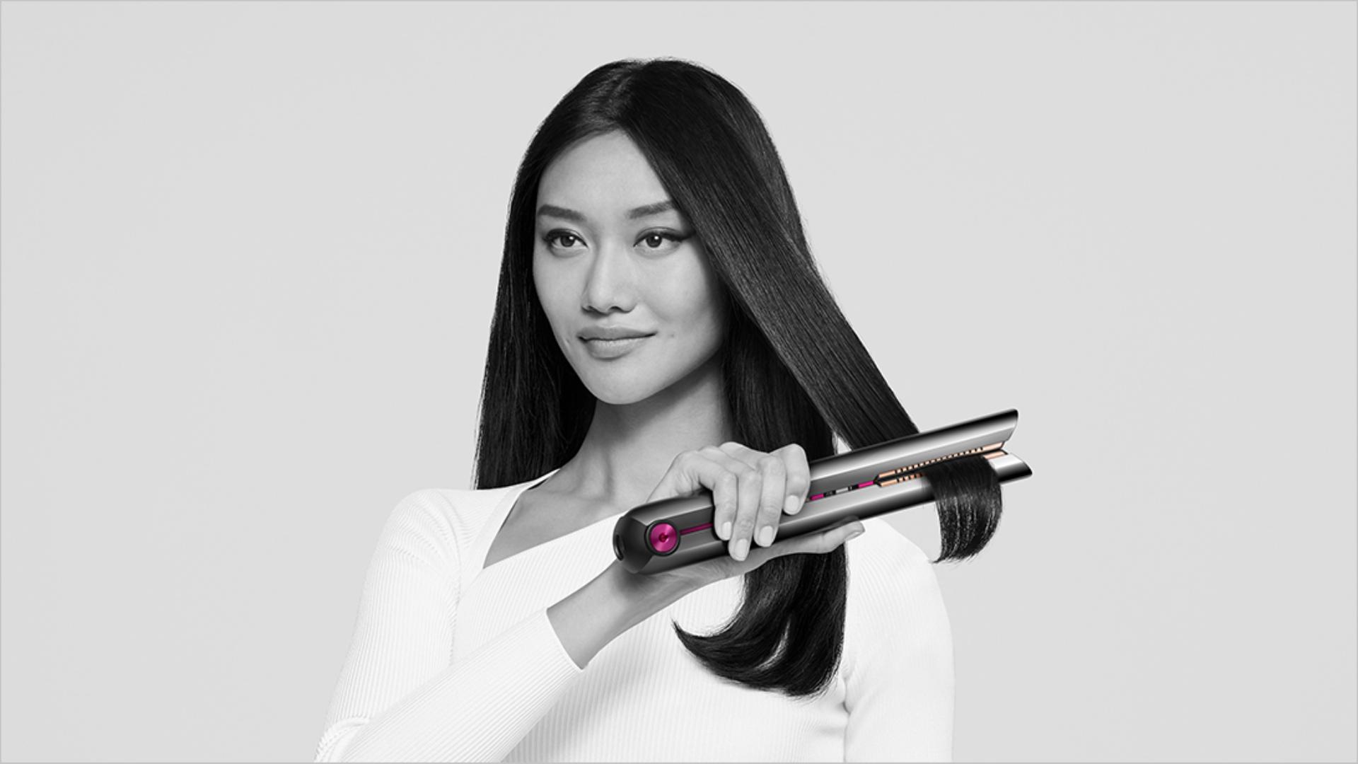 A model using the Dyson Corrale straightener