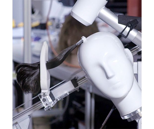 Mannequin head being tested on with the Dyson supersonic hairdryer.