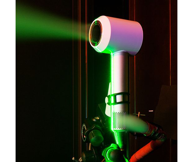 The Dyson Supersonic hair dryer. Being tested under ultra violet lights.