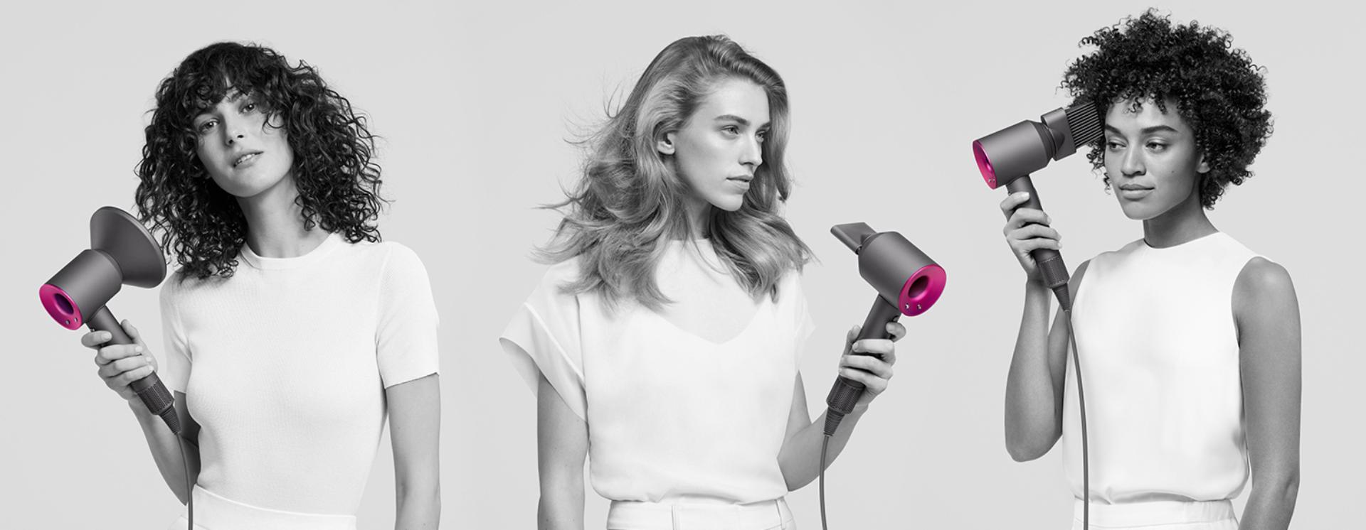 Dyson Supersonic saç kurutma makinesini kullanan üç kadın