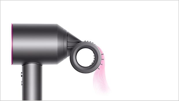 Side view of the Dyson Supersonic with Flyaway smoother attachment.
