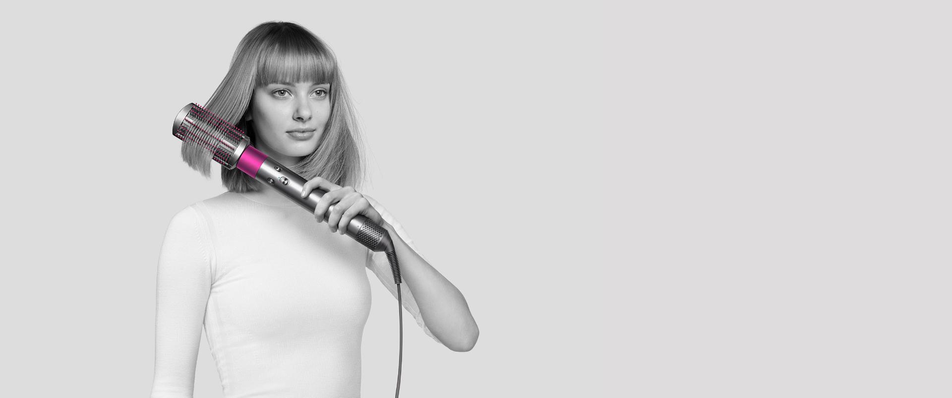 Woman using the Soft smoothing brush.