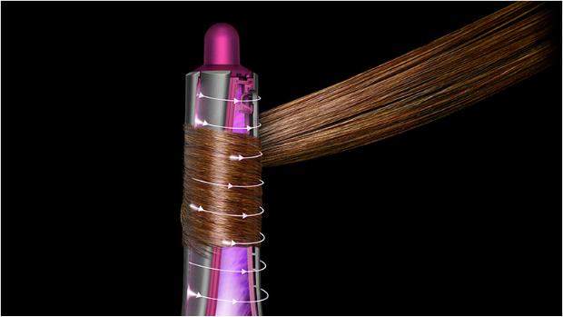 The Coanda effect wraps hair around barrel