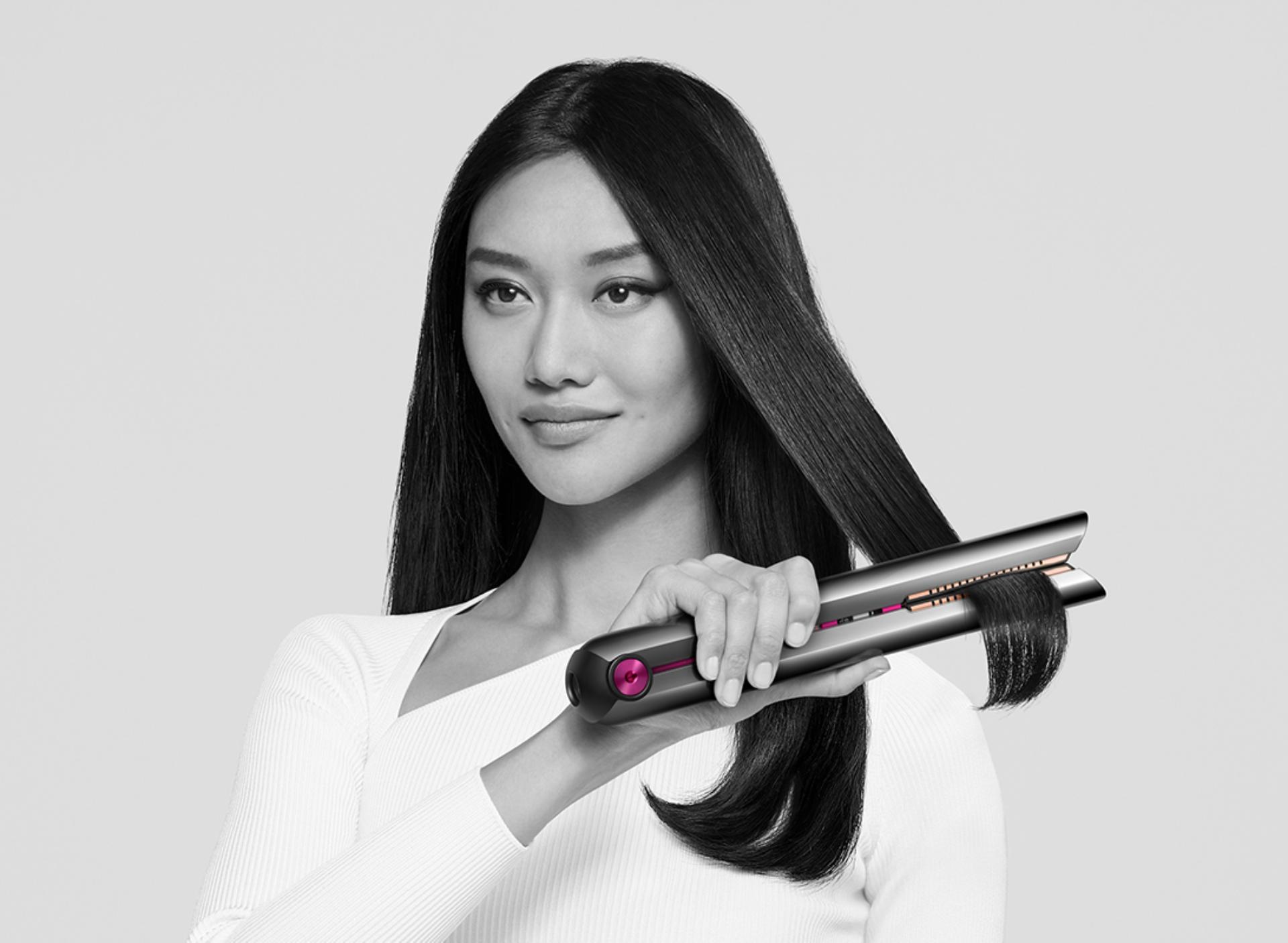 A model using the Dyson Corrale straightener