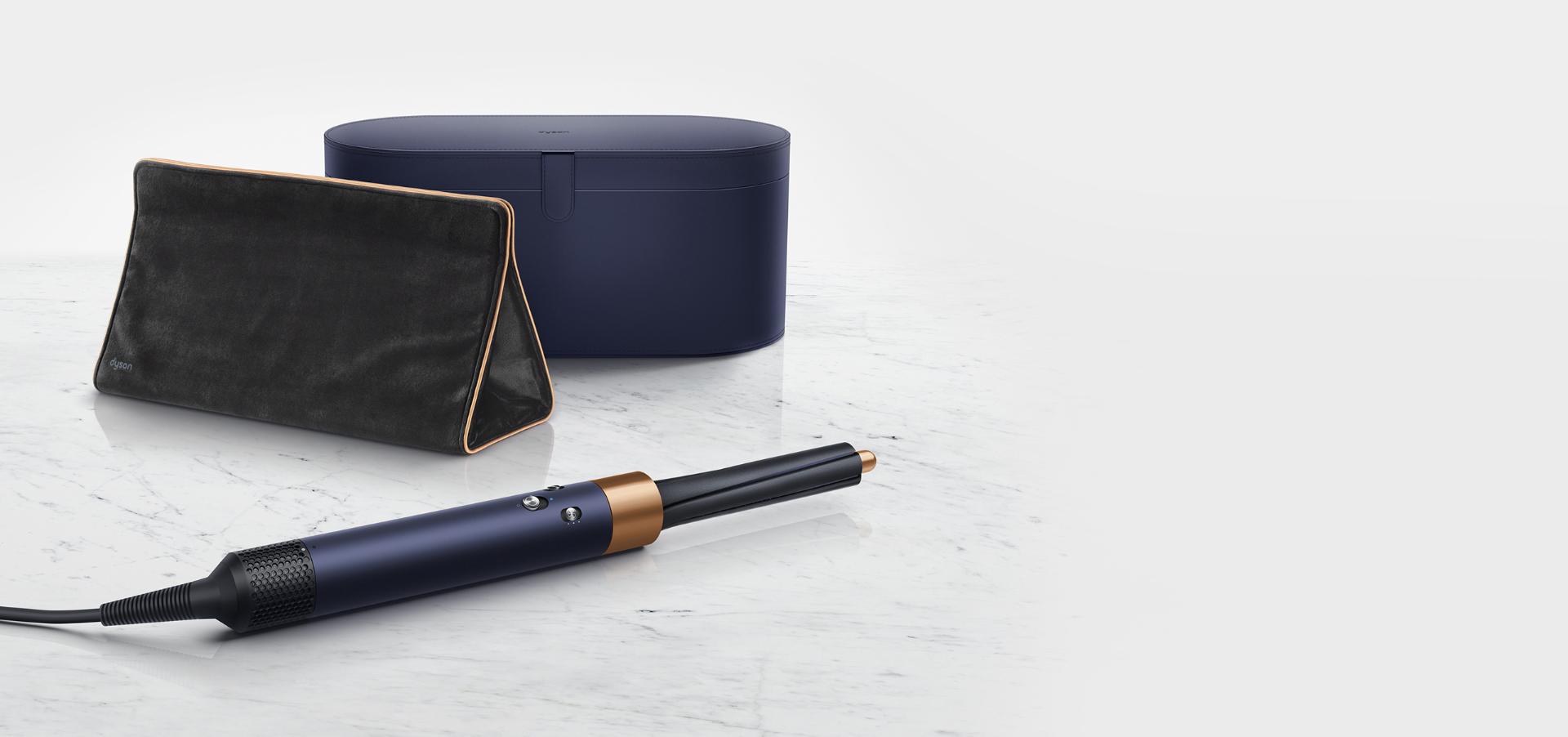 Dyson Corrale straightener Airwrap styler and Supersonic hair dryer in Prussian blue and rich copper